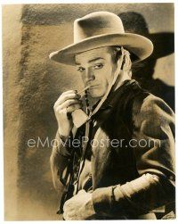 3c691 OKLAHOMA KID 7.5x9.25 still '39 c/u of James Cagney putting cigarette in mouth by Hurrell!