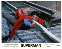 3c872 SUPERMAN 8x10 mini LC #1 '78 special effects c/u of Christopher Reeve fixing train tracks!