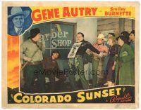 3e288 COLORADO SUNSET LC '39 Gene Autry holds Buster Crabbe while Smiley glues a sign on him!