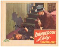 3e326 DANGEROUS LADY LC '41 Neil Hamilton kneels by dead woman on floor by stairs!