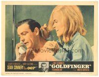 3e450 GOLDFINGER LC #2 '64 c/u of sexy Shirley Eaton behind Sean Connery as James Bond on phone!