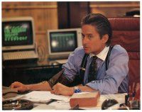 3e951 WALL STREET LC '87 c/u of Michael Douglas taking his blood pressure at desk, Oliver Stone!