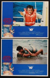 3h851 '10' 2 LCs '79 Blake Edwards, Dudley Moore c/u & making out with sexy Bo Derek on beach!