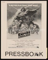 3j119 EMPIRE STRIKES BACK pressbook '80 George Lucas sci-fi classic, cool artwork by Tom Jung!