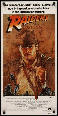 3y862 RAIDERS OF THE LOST ARK Aust daybill '81 art of adventurer Harrison Ford by Richard Amsel!