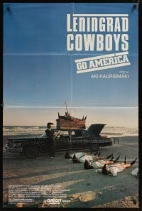 4m464 LENINGRAD COWBOYS GO AMERICA 1sh '90 great wacky image of band on beach w/black Cadillac!