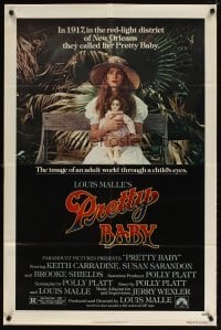 4m699 PRETTY BABY 1sh '78 directed by Louis Malle, young Brooke Shields sitting with doll!
