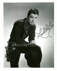5a800 LASH LA RUE signed 8x10 REPRO still '80s great close up leaning on his knee & holding hat!