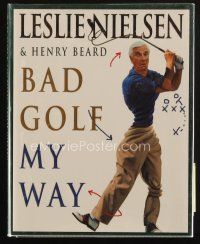 5a319 LESLIE NIELSEN signed hardcover book '96 wacky instructional book Bad Golf My Way!