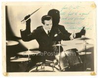 5a517 GENE KRUPA signed 8x10 still '40s wearing suit & tie & playing drums in the spotlight!
