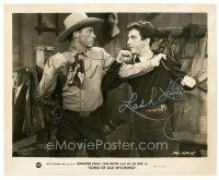 5a573 LASH LA RUE signed 8x10 still '45 close up fighting Eddie Dean from Song of Old Wyoming!