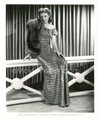 5d165 BARBARA STANWYCK 8x10 still '39 in bulky luxurious fur coat & striped metal brocade gown!