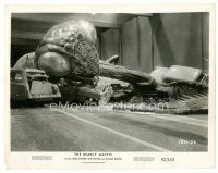 5d281 DEADLY MANTIS 8x10 still '57 great image of defeated giant monster lying on cars in tunnel!