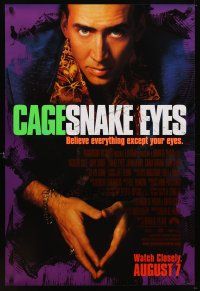 5w679 SNAKE EYES advance 1sh '98 close-up of Nicolas Cage, believe everything except your eyes!