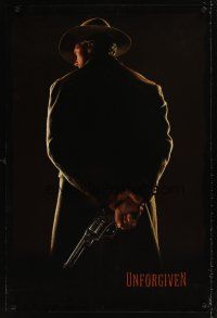5w767 UNFORGIVEN undated teaser 1sh '92 classic image of gunslinger Clint Eastwood w/back turned!