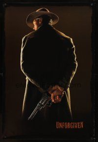 6g766 UNFORGIVEN undated teaser 1sh '92 classic image of gunslinger Clint Eastwood w/back turned!