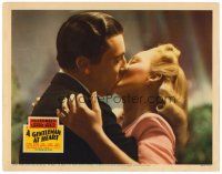 6s409 GENTLEMAN AT HEART LC '42 c/u of bookie Cesar Romero kissing pretty Carol Landis!