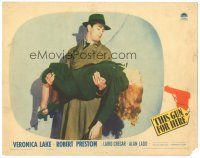 7d368 THIS GUN FOR HIRE LC '42 great c/u of Alan Ladd holding unconscious Veronica Lake!