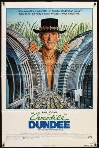 7h199 CROCODILE DUNDEE 1sh '86 cool art of Paul Hogan looming over New York City by Daniel Goozee!