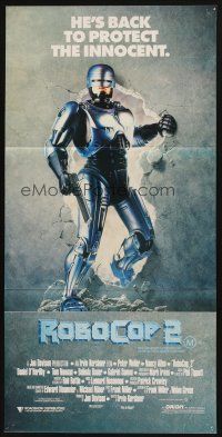 7m821 ROBOCOP 2 Aust daybill '90 cyborg policeman Peter Weller busts through wall, sci-fi sequel!