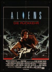 7m229 ALIENS German '86 James Cameron, cool image of Sigourney Weaver w/giant gun & Carrie Henn!