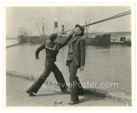 7s216 COME & GET IT 8x10 still '29 sailor Bob Steele gives a K.O. punch to Asian man on pier!