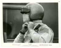 7s502 LE MANS 8x10 still '71 c/u of race car driver Steve McQueen putting on his mask & helmet!