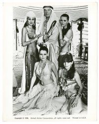 7s838 SPY WHO LOVED ME 8x10 still '77 Roger Moore as James Bond surrounded by sexy harem girls!