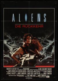 8c086 ALIENS German '86 James Cameron, cool image of Sigourney Weaver w/giant gun & Carrie Henn!