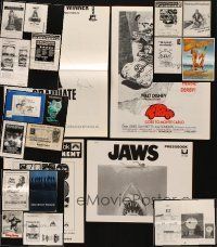 8e094 LOT OF 21 UNFOLDED AND FOLDED CUT PRESSBOOKS '56 - '82 Jaws, Graduate, E.T & more!