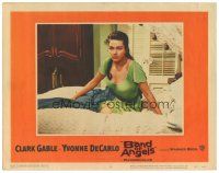 8g572 BAND OF ANGELS LC #8 '57 c/u of beautiful slave mistress Yvonne De Carlo sitting on bed!