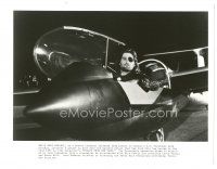 8k303 ESCAPE FROM NEW YORK 8x10 still '81 Kurt Russell utilizes glider to soar into massive prison!