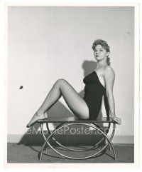 8k738 PEGGIE CASTLE 8x10 still '50s sexy portrait seated on table & wearing fishnet stockings!