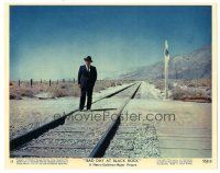 8k004 BAD DAY AT BLACK ROCK color 8x10 still #11 '55 far shot of Spencer Tracy on railroad tracks!