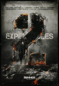 8s250 EXPENDABLES 2 teaser DS 1sh '12 image of tough-guy Sylvester Stallone in blown-up building!