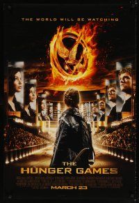 8s398 HUNGER GAMES advance DS 1sh '12 Jennifer Lawrence, world will be watching, image of arena!
