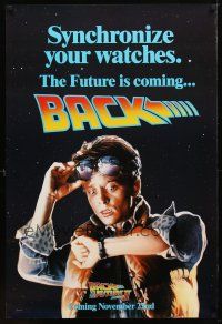 9k043 BACK TO THE FUTURE II teaser 1sh '89 art of Michael J. Fox as Marty, synchronize your watch!