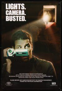 9k395 LIGHTS CAMERA BUSTED DS 1sh '00s image of man caught recording movie!