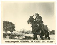 9t806 OUTLAW JOSEY WALES 8x10 still '76 Clint Eastwood on horseback by dead guys on ground!