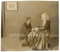 9t275 TOMORROW'S LOVE candid 7x8.25 still '25 director Paul Bern poses Ruby Lafayette on chair!
