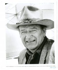 9t947 TRAIN ROBBERS 8x10 still '73 best close portrait of cowboy John Wayne under umbrella!