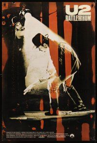 9w799 U2 RATTLE & HUM int'l 1sh '88 great image of Irish rockers Bono & The Edge on stage