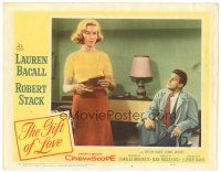 9y493 GIFT OF LOVE LC #7 '58 Robert Stack looks at sexy Lauren Bacall holding papers!