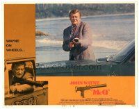 9y656 McQ LC #4 '74 John Sturges, close up of John Wayne firing his machine gun!