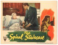 9y874 SPIRAL STAIRCASE LC '46 great close up of doctor Kent Smith helping Ethel Barrymore in bed!