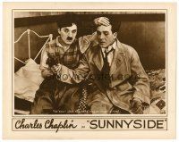 9y892 SUNNYSIDE LC R20s Charlie Chaplin finds the smart aleck city chap is no longer a rival!