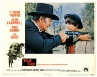 9y951 TRUE GRIT LC #1 '69 John Wayne as Rooster Cogburn aims gun over Kim Darby's shoulder!