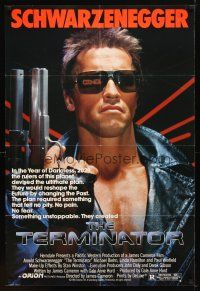 1g863 TERMINATOR 1sh '84 close up of classic cyborg Arnold Schwarzenegger with gun!