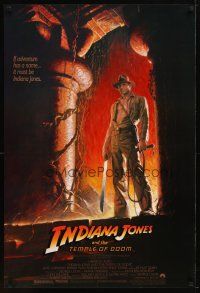 1j344 INDIANA JONES & THE TEMPLE OF DOOM 1sh '84 adventure is Ford's name, Bruce Wolfe art!