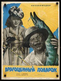 1k725 DRAGOTSENNYY PODAROK Russian 15x20 '56 great Manukhin art of man w/fish & disapproving woman!
